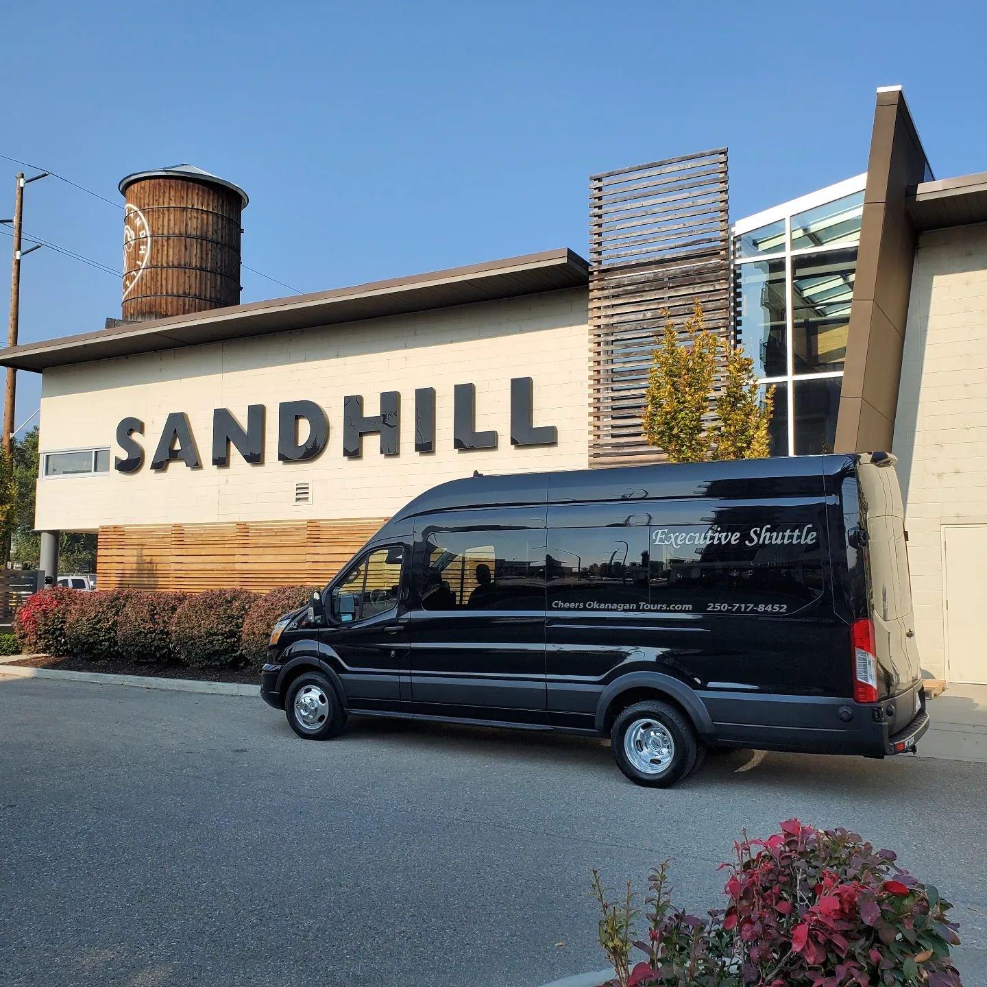 van parked in front of winery