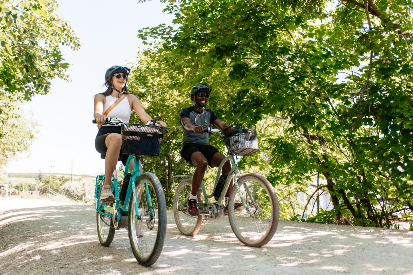 two people riding bikes
