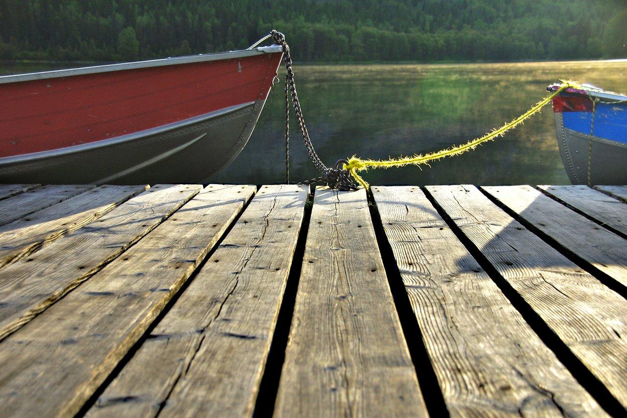 two boats connected to a dock