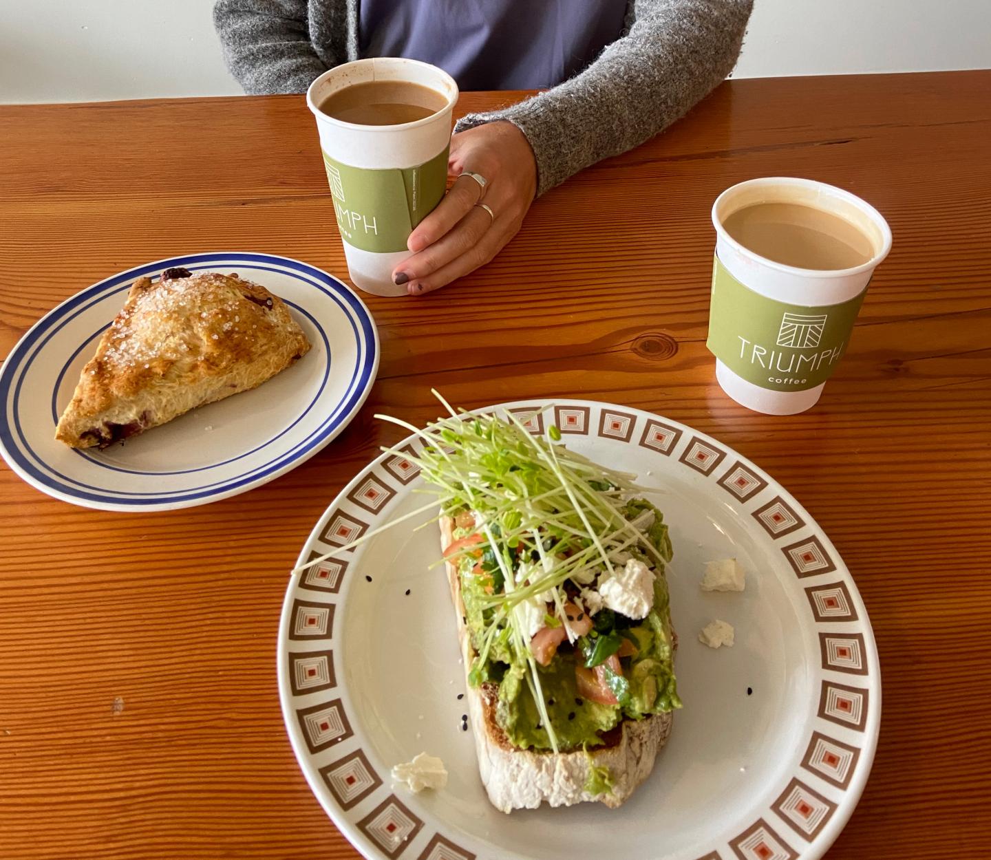 table with coffee cups and cafe style food