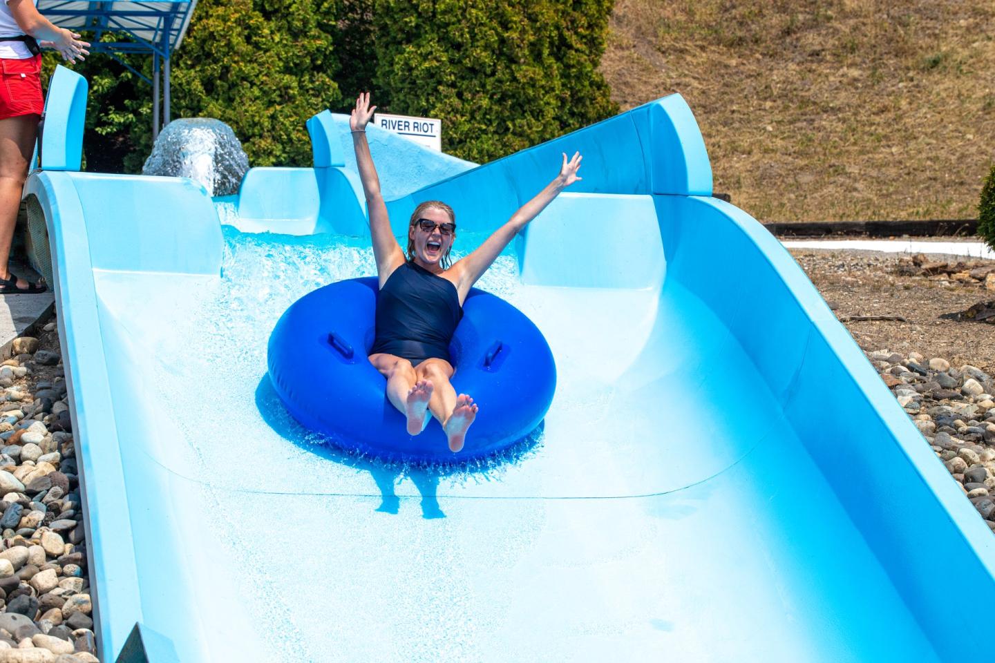 woman on waterpark tube