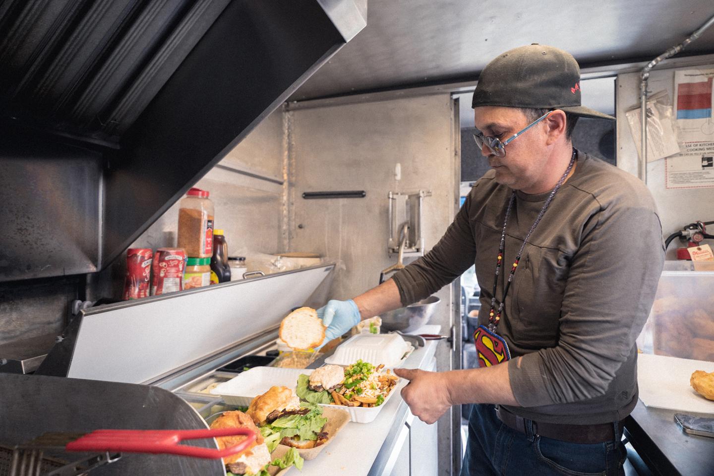 chef making bannock burger