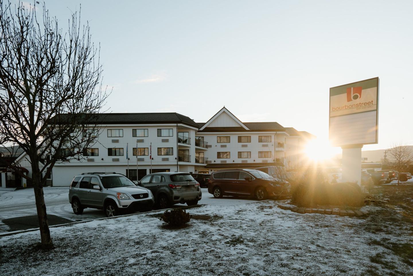outside of hotel with parking lot
