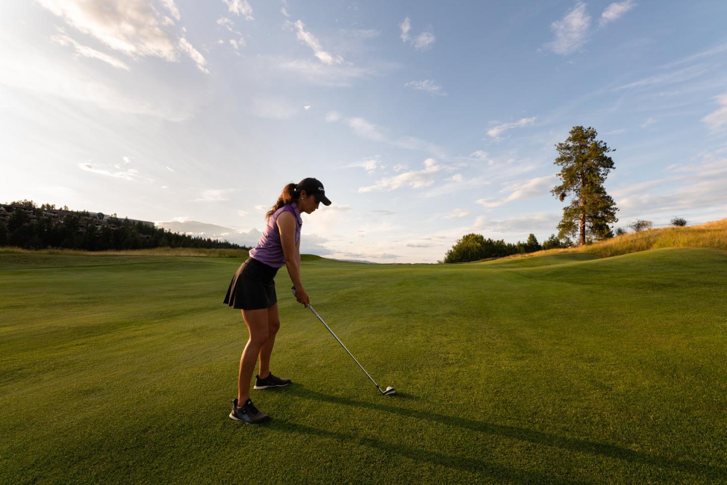 Woman Playing Golf at Predator Ridge