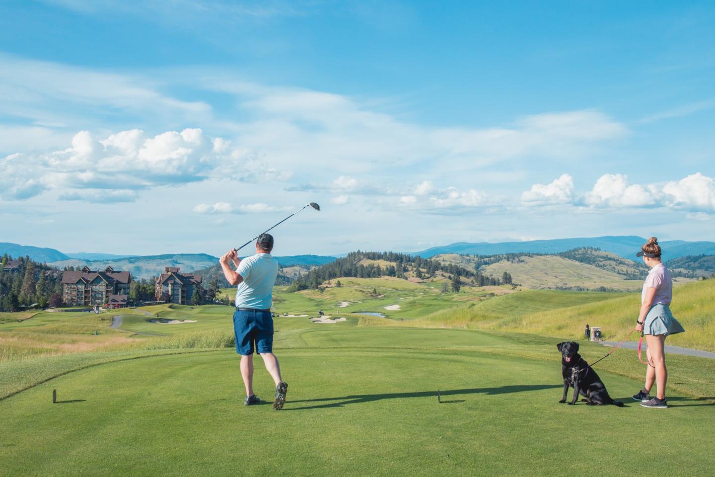 golfing with dog at Predator Ridge