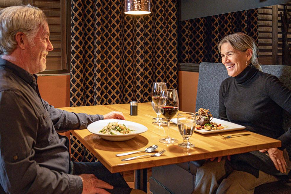 two people having dinner in restaurant 