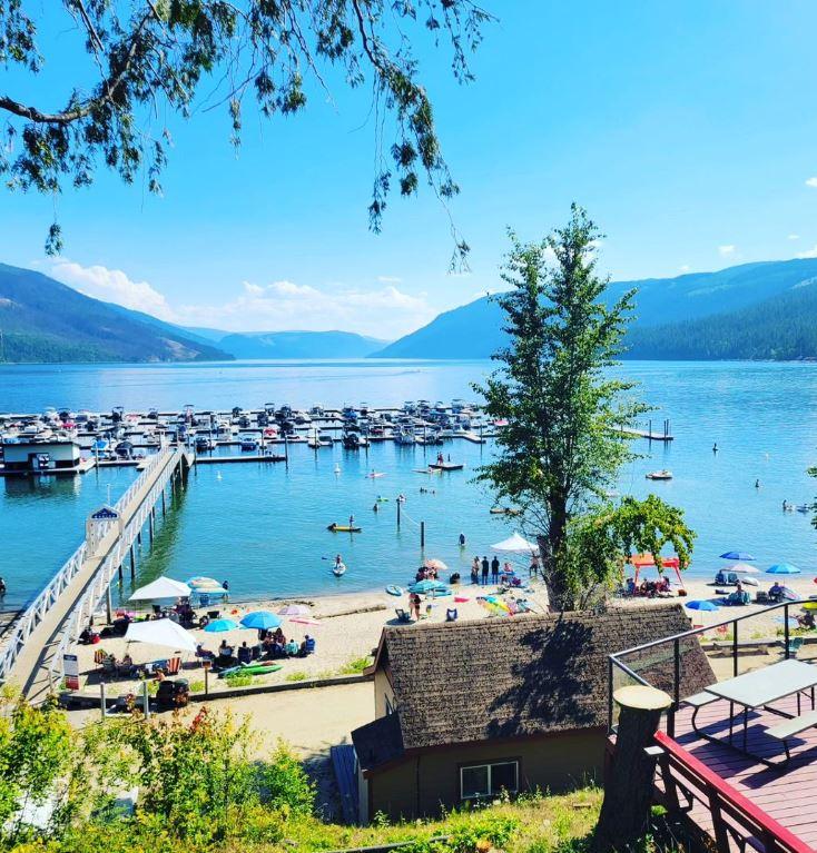 marina and busy beach next to Mabel Lake