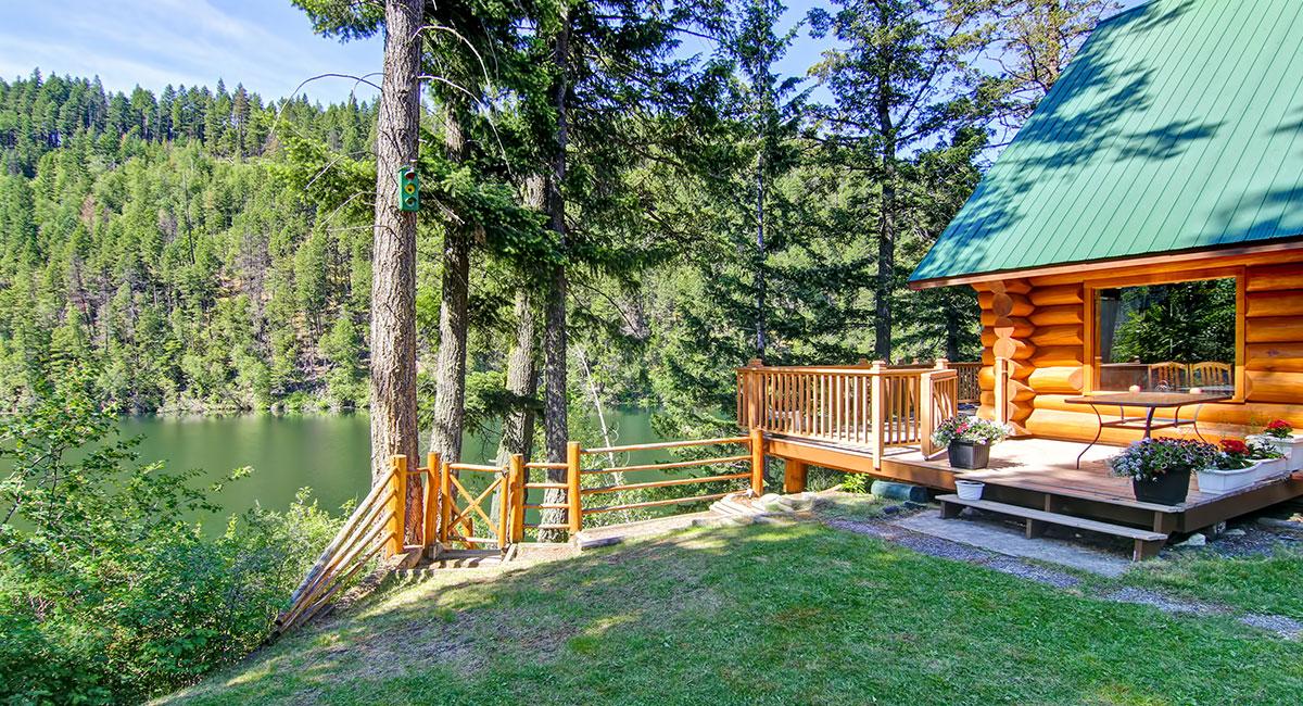cabin next to a lake