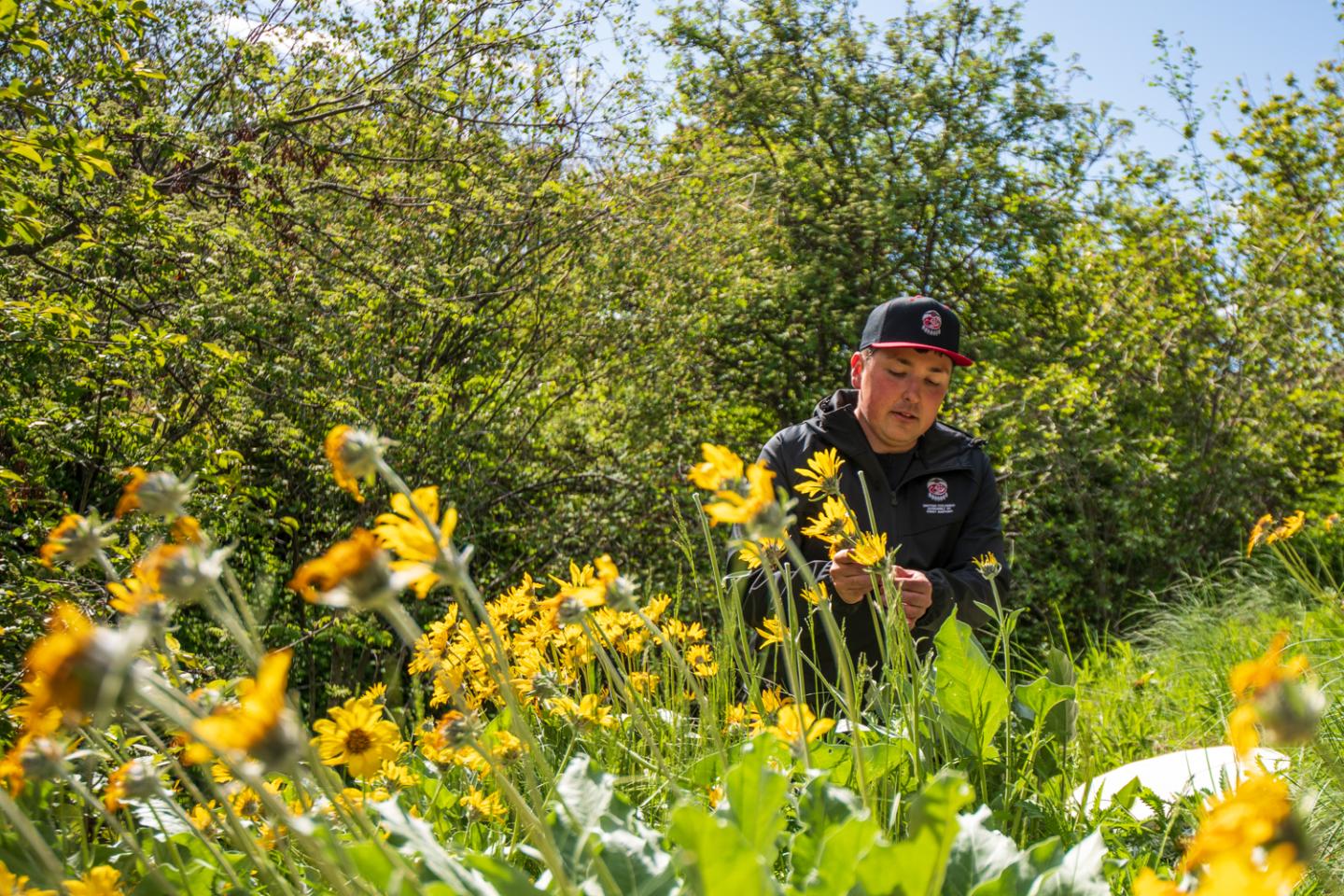 Man standing in the Kalamalka Indigenous Garden