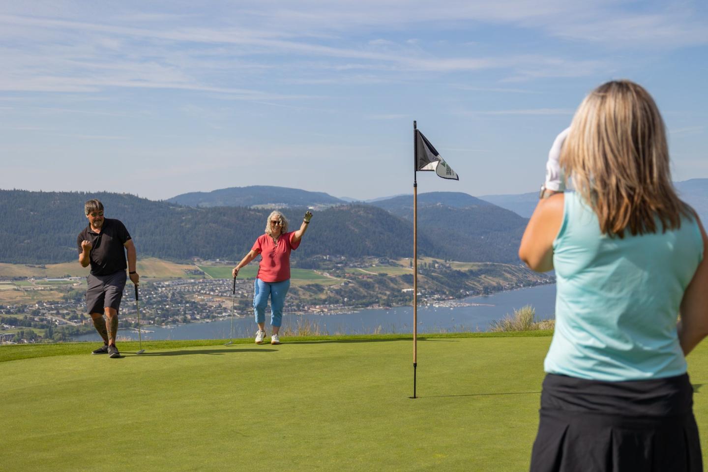 three people playing golf at The Rise Resort