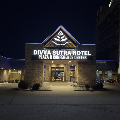 Divya Sutra Hotel Vernon exterior shot at night