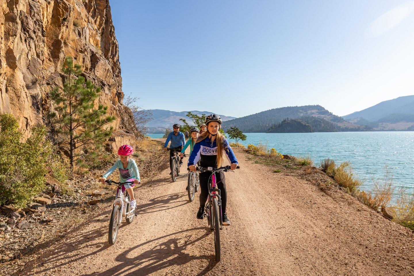 Family biking the Okanagan Rail Trail