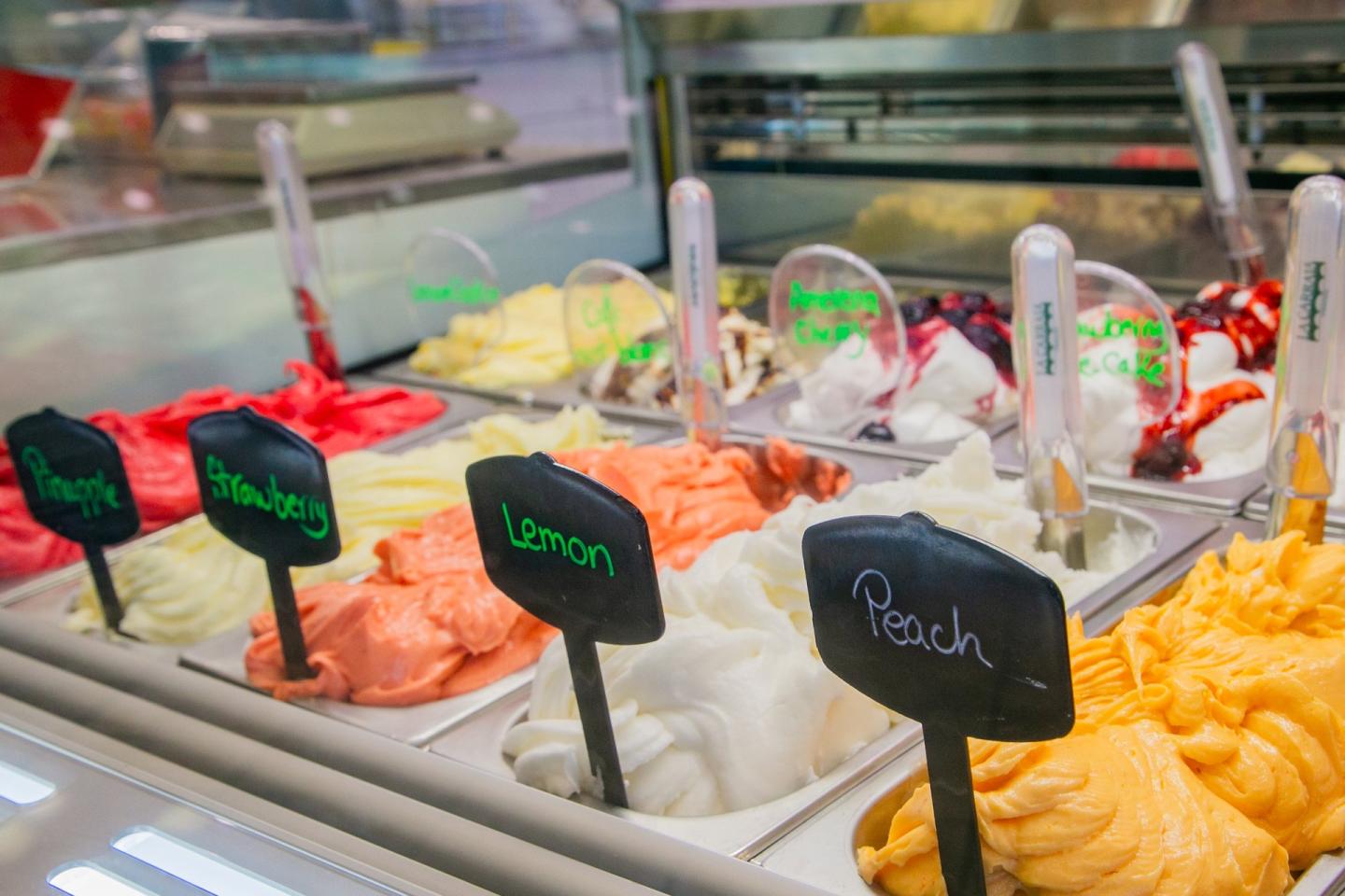 Different fruity flavours of gelato on display