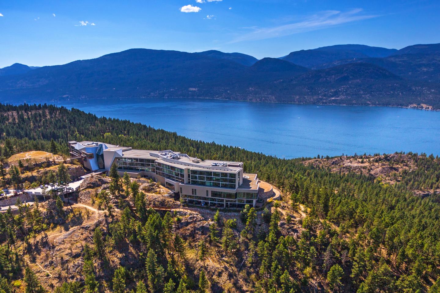 aerial view of Sparkling Hill Resort next to Okanagan lake