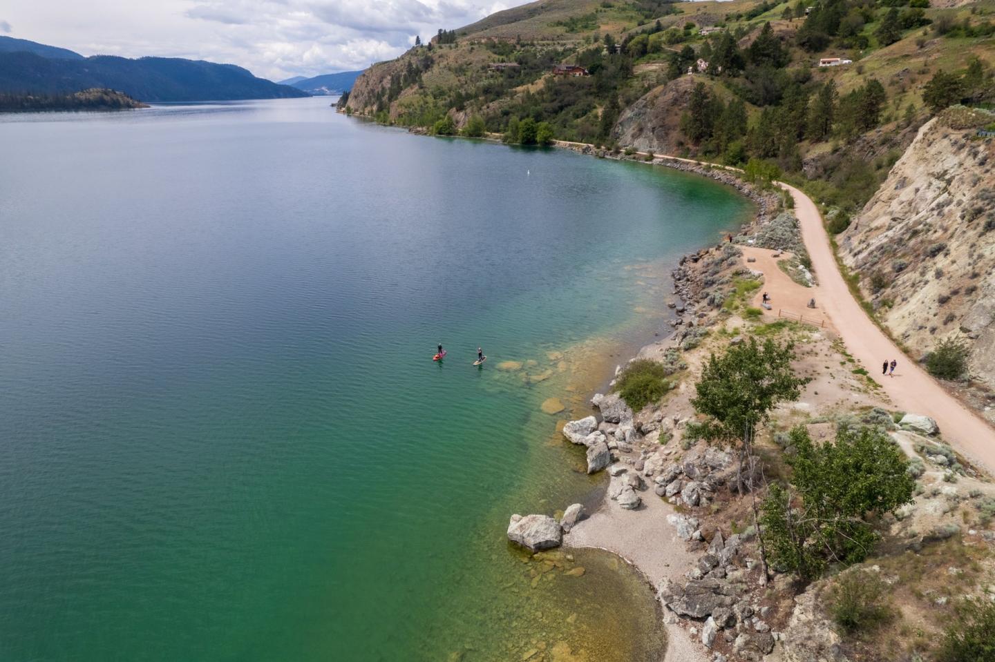 two paddleboarders along the Kalamalka Lake Paddle Trail