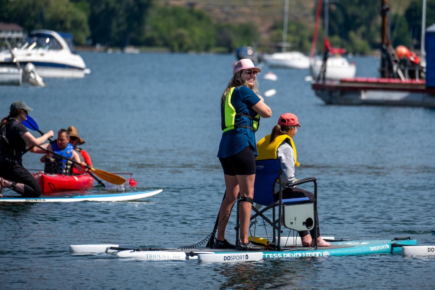 adaptive paddleboard on lake