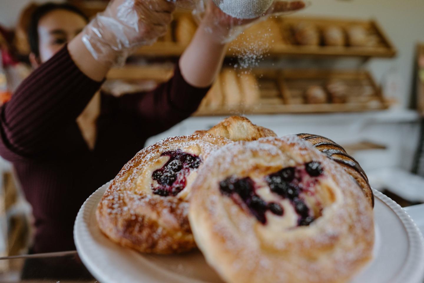 Hot Bread Shoppe - dusting of icing sugar on pastries
