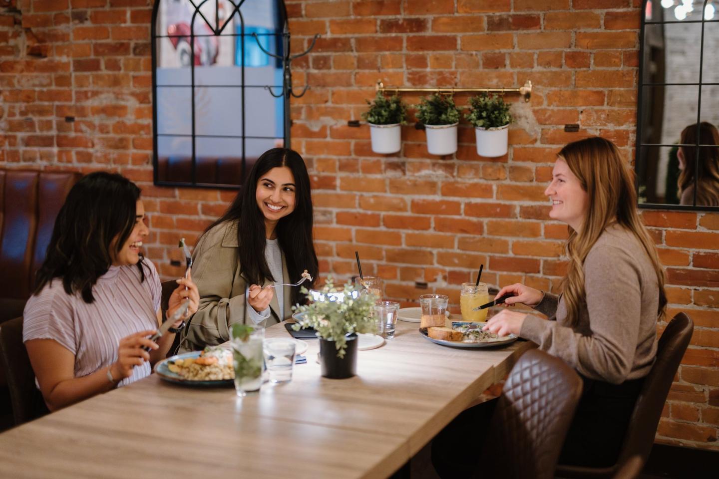 three ladies eating at the phoenix steakhouse
