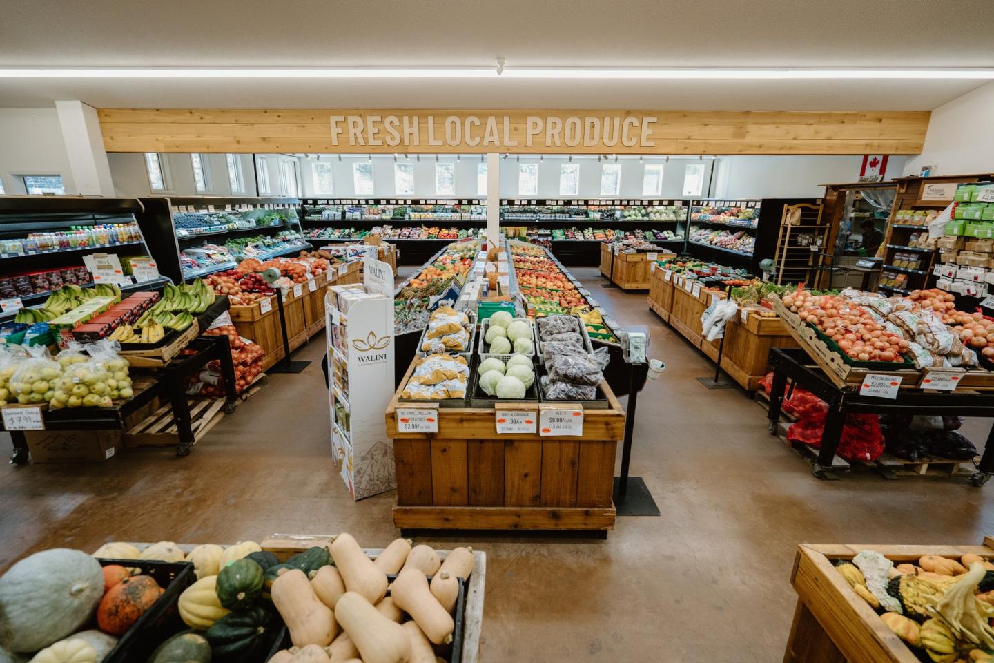 farm fresh produce stands inside market
