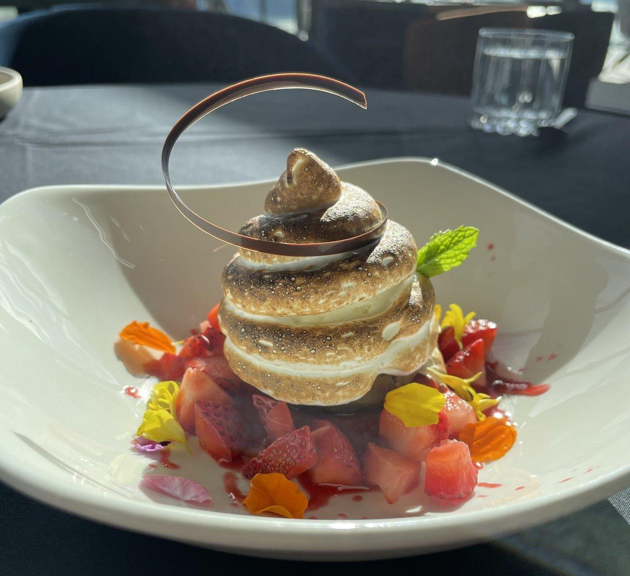 fancy meringue dessert on white plate