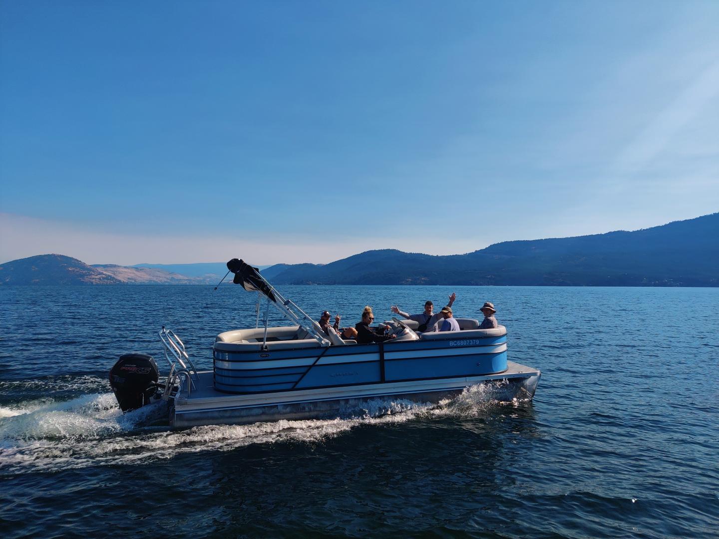 Okanagan Leisure Rentals Image of people in boat