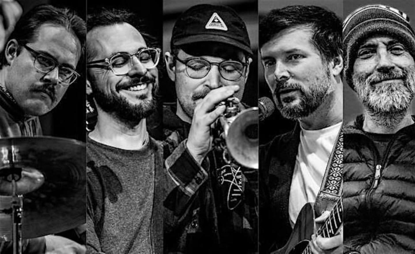 Black and white photo of five men with musical instruments.