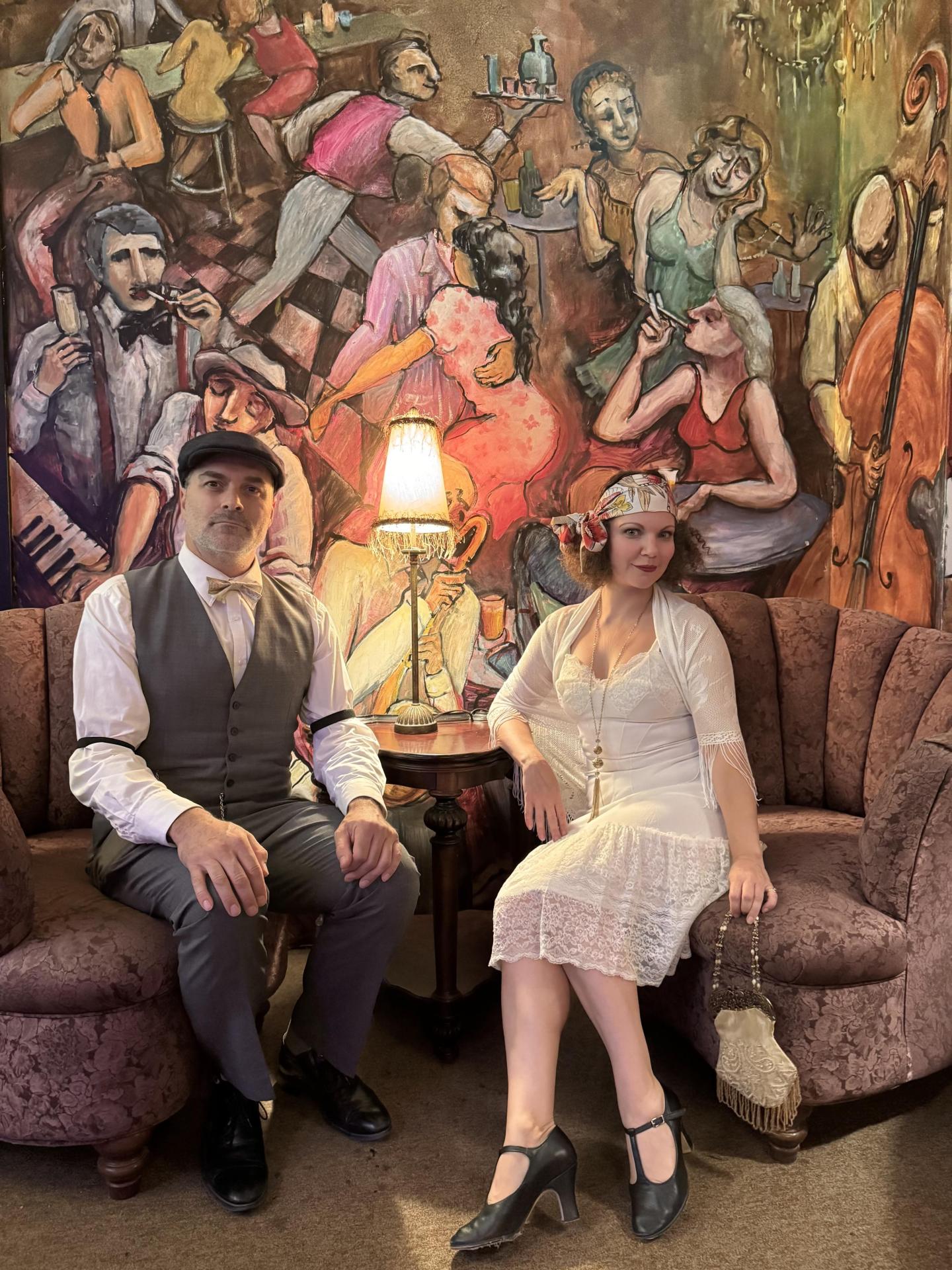 Hosts Lady Amelia Antonia Serafina Sirianni and Mr Harrison Robert Kelly Coe III in 1920's attire at the Cheeky Speakeasy.