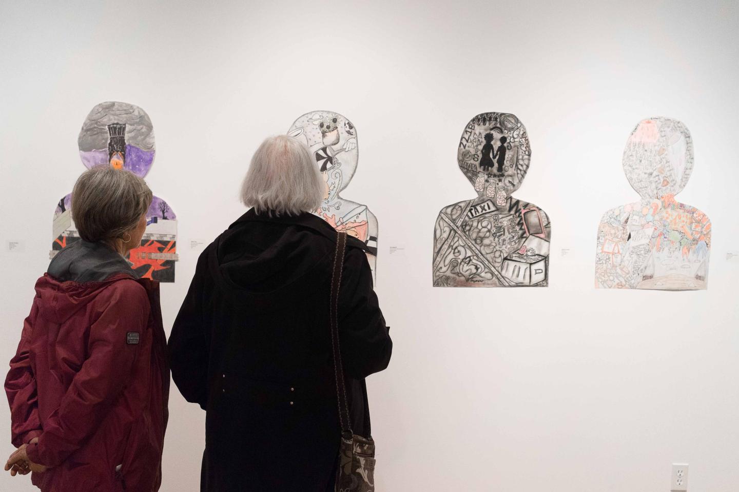 Women viewing artwork in the gallery